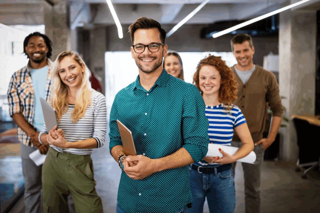 Smiling group of diverse young professionals.
